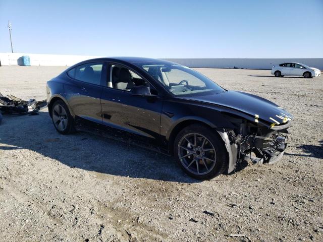 Photo 4 from auction – 2021 TESLA MODEL 3 with VIN 5YJ3E1EA3MF093464