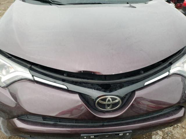 Photo 12 from auction – 2018 TOYOTA RAV4 LE with VIN 2T3ZFREV8JW415868