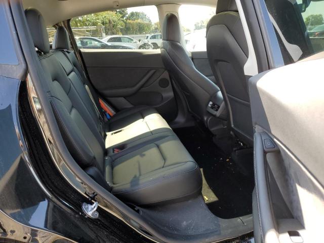 Photo 11 from auction – 2022 TESLA MODEL Y with VIN 7SAYGDEE3NF481741