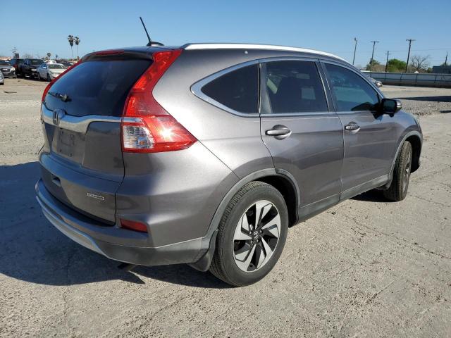 Photo 3 from auction – 2015 HONDA CR-V TOURI with VIN 5J6RM3H93FL021412