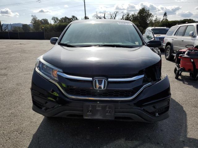Photo 5 from auction – 2016 HONDA CR-V LX with VIN 2HKRM4H31GH701550