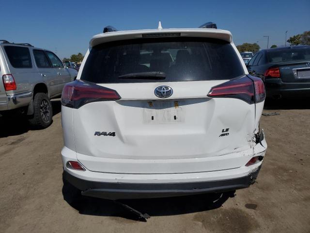 Photo 6 from auction – 2018 TOYOTA RAV4 LE with VIN 2T3BFREV5JW830471