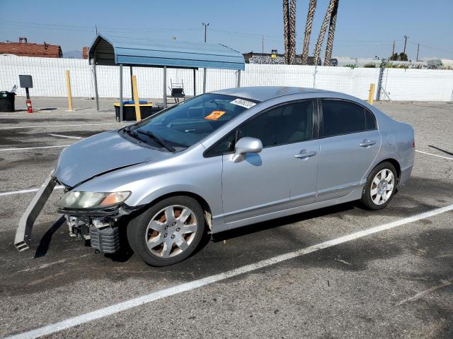 HONDA CIVIC LX 2011 with VIN 2HGFA1F55BH306031 - Photo from auction