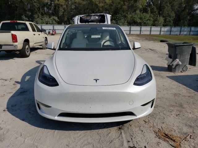 Photo 5 from auction – 2022 TESLA MODEL Y with VIN 7SAYGDEFXNF374940