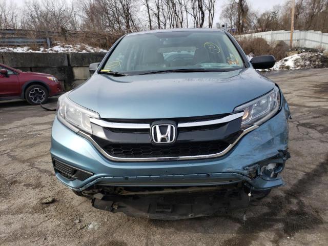 Photo 5 from auction – 2015 HONDA CR-V LX with VIN 5J6RM4H32FL035173