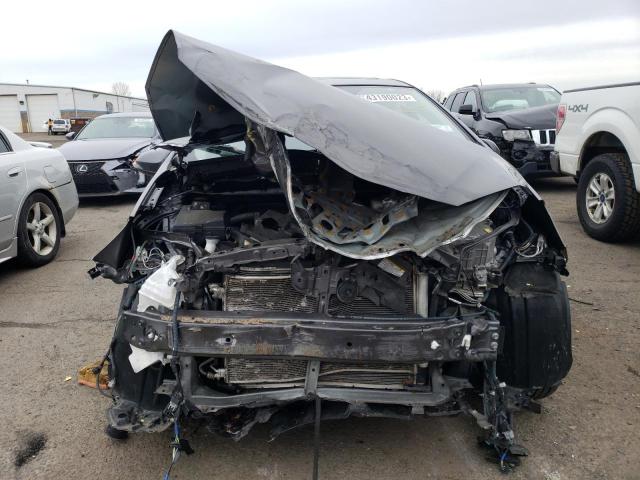 Photo 5 from auction – 2015 TOYOTA PRIUS C with VIN JTDKDTB32F1111965