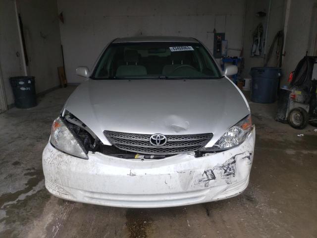Photo 11 from auction – 2004 TOYOTA CAMRY LE with VIN 4T1BE30KX4U859748