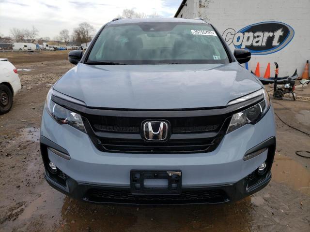 Photo 5 from auction – 2022 HONDA PILOT TRAI with VIN 5FNYF6H80NB071013