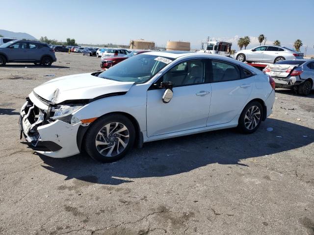 HONDA CIVIC EX 2018 with VIN 2HGFC2F74JH529161 - Photo from auction