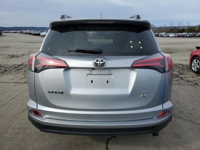 Photo 6 from auction – 2018 TOYOTA RAV4 LE with VIN JTMBFREV2JJ207422