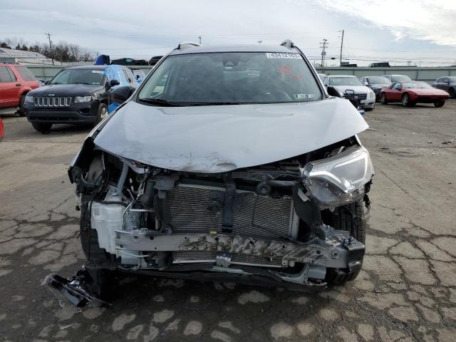 Photo 5 from auction – 2018 TOYOTA RAV4 LE with VIN JTMBFREV2JJ207422