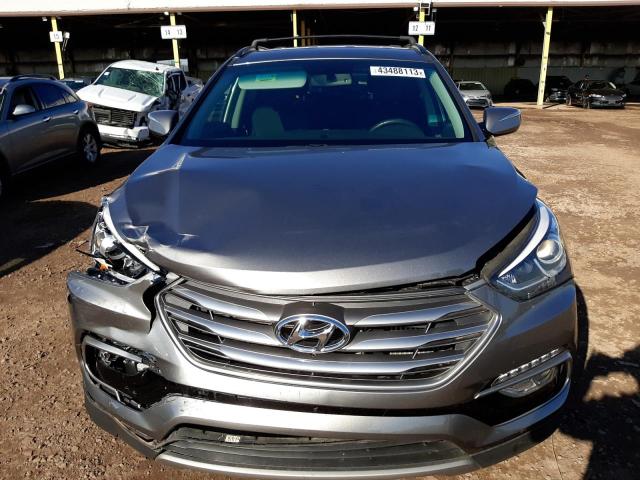 Photo 5 from auction – 2017 HYUNDAI SANTA FE S with VIN 5NMZU4LA9HH040354