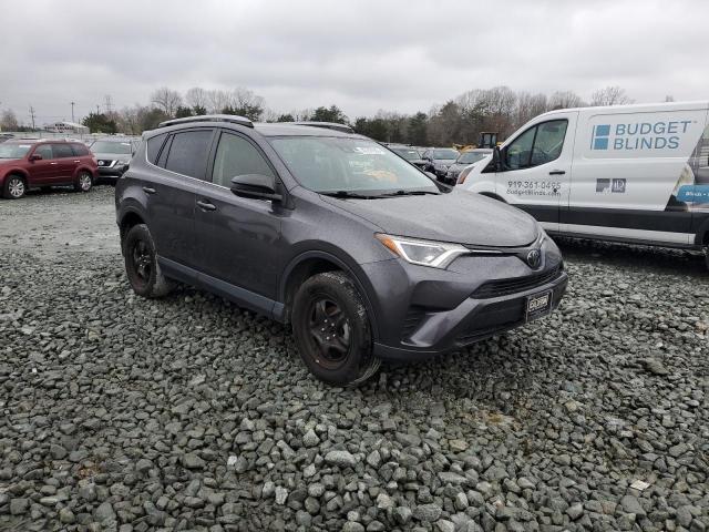 Photo 4 from auction – 2018 TOYOTA RAV4 LE with VIN JTMBFREV1JJ731497