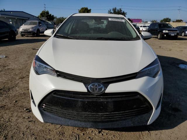 Photo 5 from auction – 2018 TOYOTA COROLLA L with VIN 5YFBURHE6JP825730