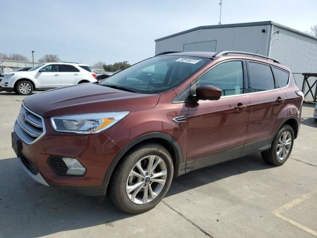 FORD ESCAPE SE 2018 with VIN 1FMCU0GD9JUC90853 - Photo from auction