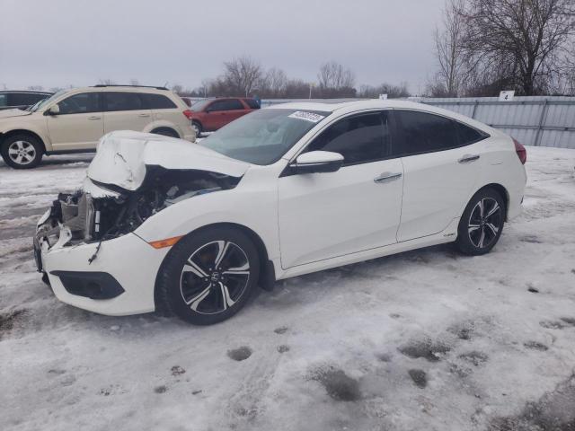 HONDA CIVIC TOUR 2016 with VIN 2HGFC1F98GH105695 - Photo from auction