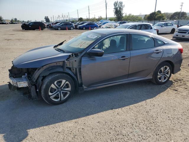 Photo 1 from auction – 2018 HONDA CIVIC LX with VIN 19XFC2F50JE030205