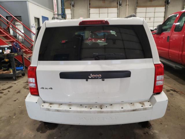 Photo 6 from auction – 2009 JEEP PATRIOT SP with VIN 1J4FF28B59D205792