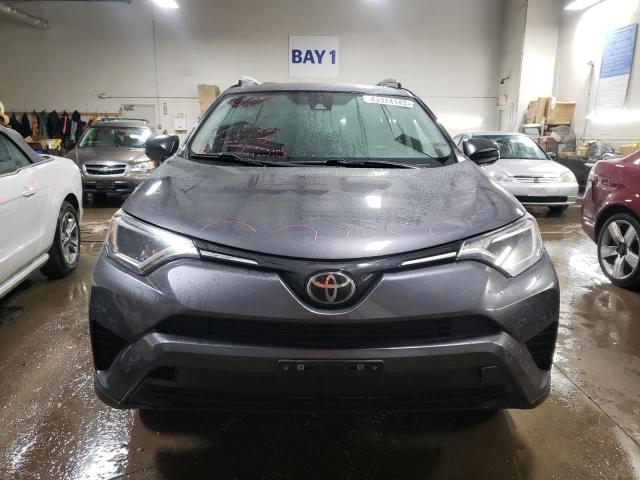 Photo 5 from auction – 2017 TOYOTA RAV4 LE with VIN 2T3BFREV8HW577964