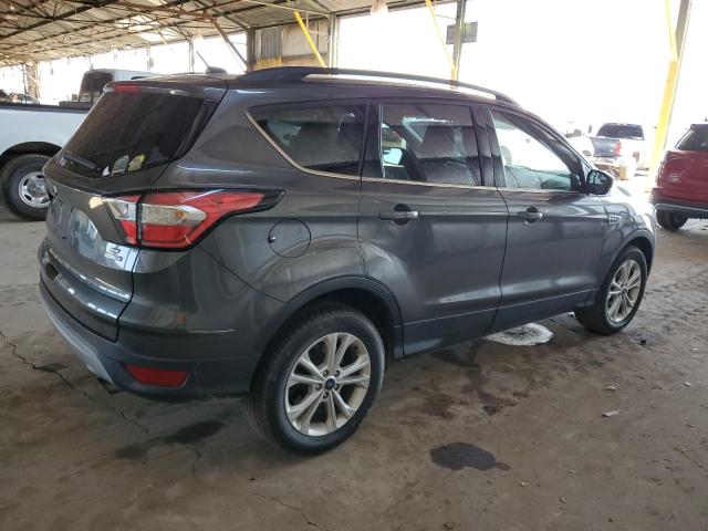 Photo 3 from auction – 2018 FORD ESCAPE SE with VIN 1FMCU9GD4JUC36798