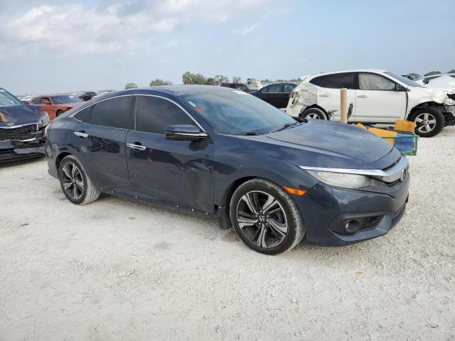 Photo 4 from auction – 2016 HONDA CIVIC TOUR with VIN 19XFC1F97GE001998