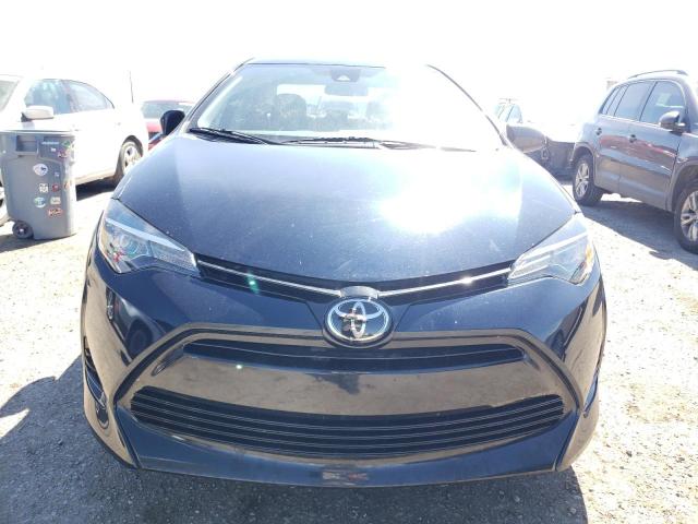 Photo 5 from auction – 2018 TOYOTA COROLLA with VIN 5YFBURHE3JP849452