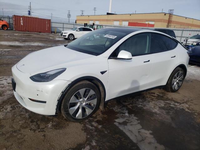 TESLA MODEL Y 2022 with VIN 7SAYGAEE4NF545283 - Photo from auction