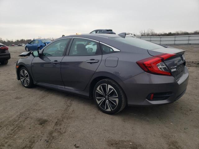 Photo 2 from auction – 2016 HONDA CIVIC EX with VIN 2HGFC1F30GH653573