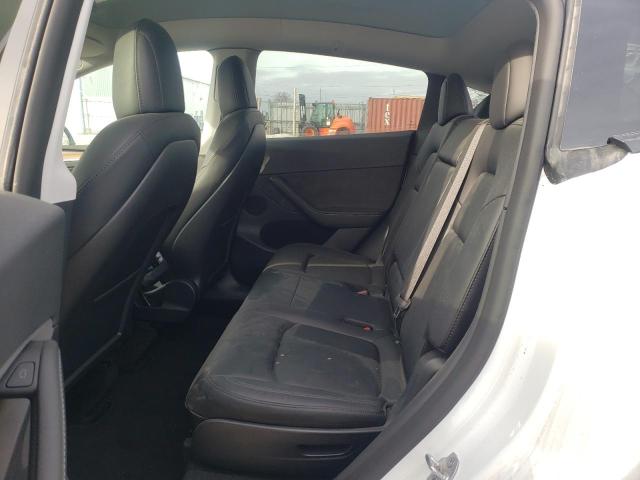 Photo 11 from auction – 2022 TESLA MODEL Y with VIN 7SAYGAEE4NF545283