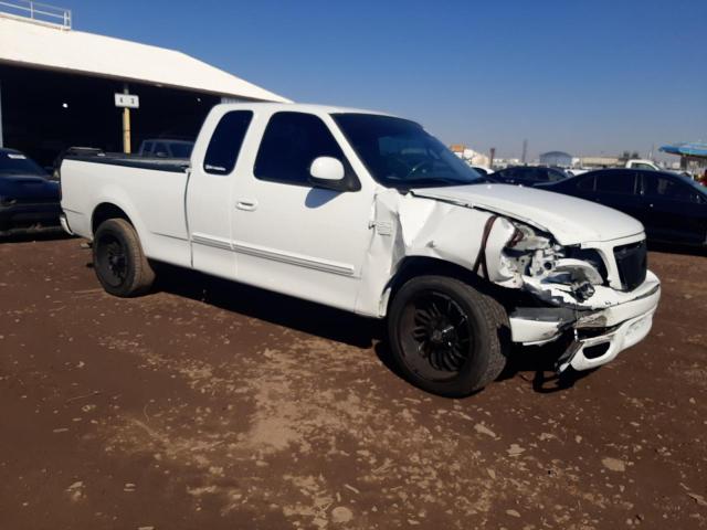 Photo 4 from auction – 2002 FORD F150 with VIN 1FTRX17W92KC06704