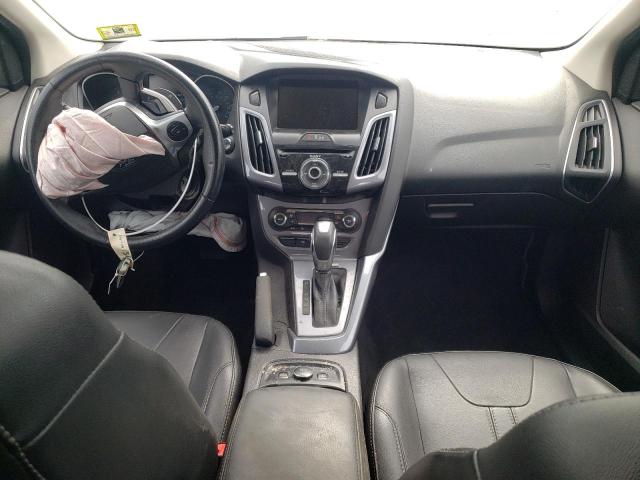 Photo 8 from auction – 2014 FORD FOCUS TITA with VIN 1FADP3N2XEL243383