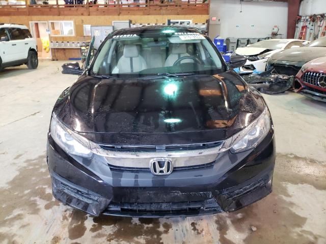Photo 5 from auction – 2018 HONDA CIVIC EX with VIN 19XFC2F75JE023557