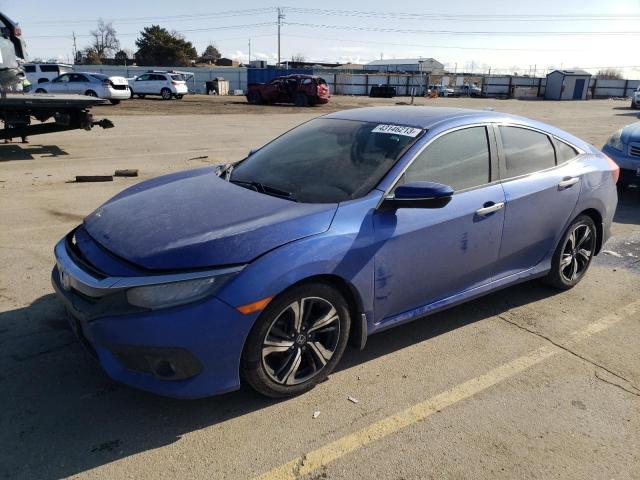 HONDA CIVIC TOUR 2016 with VIN 2HGFC1F98GH649565 - Photo from auction