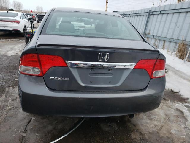 Photo 6 from auction – 2010 HONDA CIVIC DX with VIN 2HGFA1F21AH030662