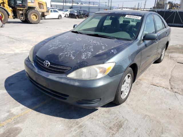 TOYOTA CAMRY LE 2002 with VIN 4T1BF32KX2U538820 - Photo from auction