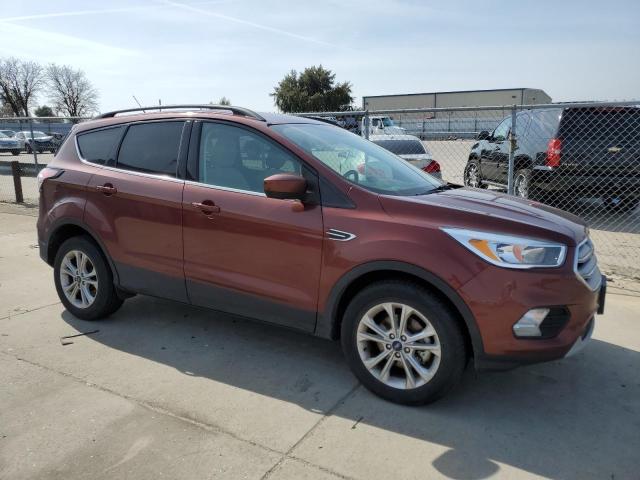 Photo 4 from auction – 2018 FORD ESCAPE SE with VIN 1FMCU0GD9JUC90853
