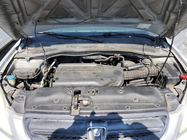 Photo 12 from auction – 2004 HONDA PILOT EX with VIN 2HKYF184X4H504658
