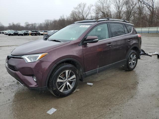 TOYOTA RAV4 XLE 2017 with VIN 2T3RFREV1HW674034 - Photo from auction