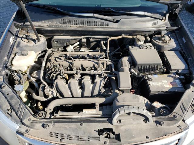 Photo 11 from auction – 2009 KIA OPTIMA LX with VIN KNAGE228395299348