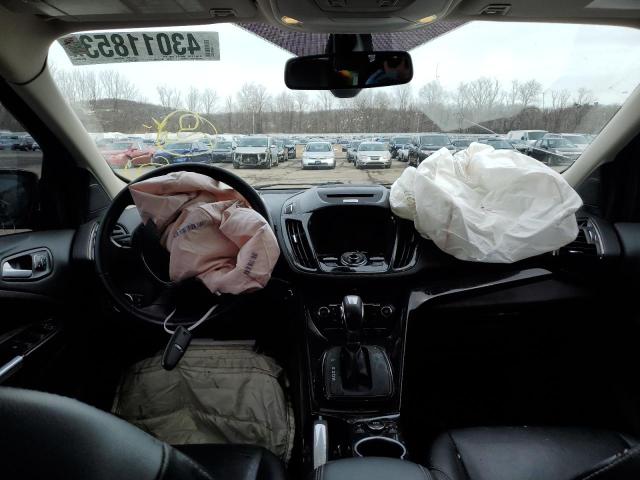 Photo 8 from auction – 2016 FORD ESCAPE TIT with VIN 1FMCU9J92GUB85878