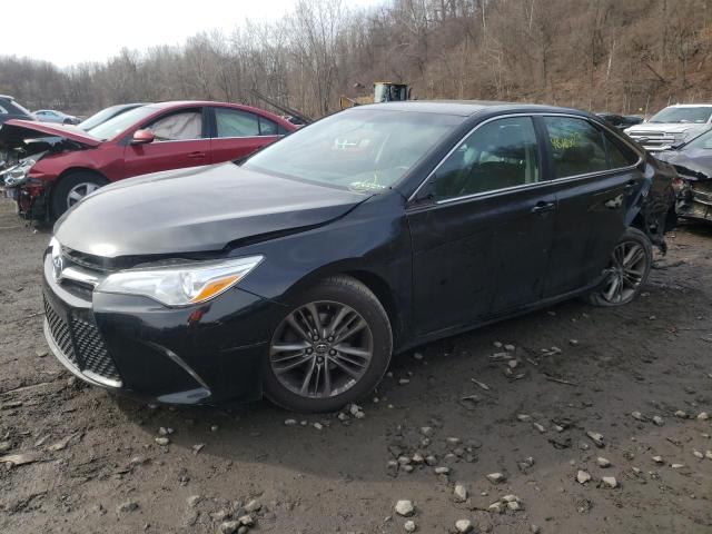 TOYOTA CAMRY LE 2017 with VIN 4T1BF1FK0HU310705 - Photo from auction
