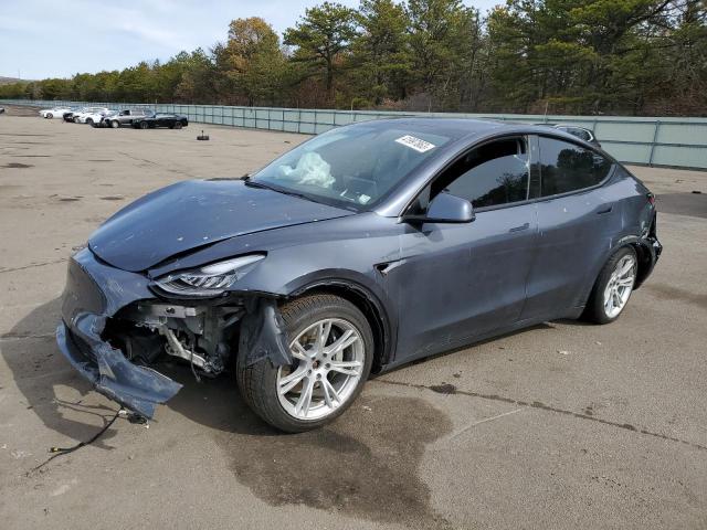 TESLA MODEL Y 2021 with VIN 5YJYGAEE3MF113148 - Photo from auction