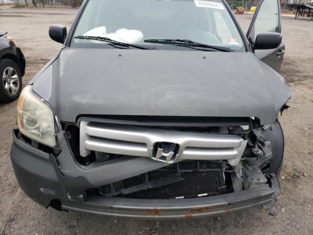 Photo 12 from auction – 2007 HONDA PILOT LX with VIN 2HKYF18117H516837