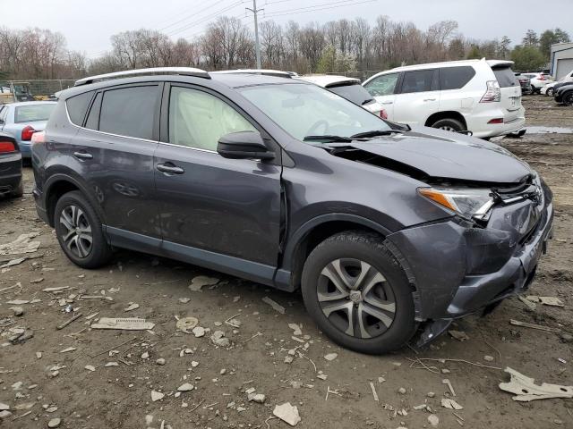 Photo 4 from auction – 2016 TOYOTA RAV4 LE with VIN JTMBFREV6GJ062202