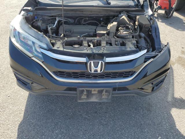 Photo 11 from auction – 2016 HONDA CR-V LX with VIN 2HKRM4H31GH701550