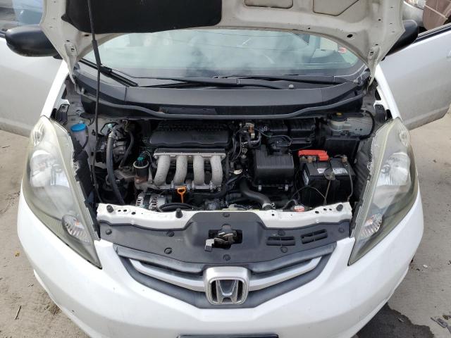 Photo 11 from auction – 2009 HONDA FIT with VIN JHMGE88259C006049
