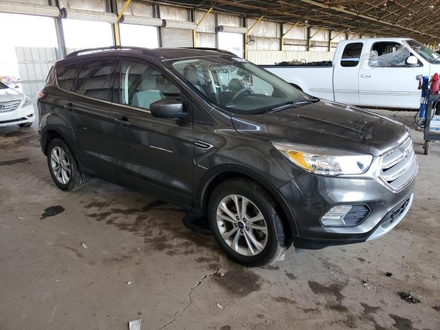 Photo 4 from auction – 2018 FORD ESCAPE SE with VIN 1FMCU9GD4JUC36798
