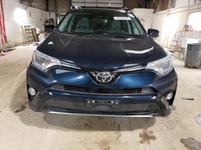 Photo 5 from auction – 2017 TOYOTA RAV4 XLE with VIN 2T3RFREV3HW553571