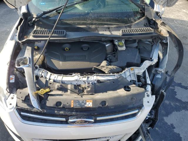 Photo 11 from auction – 2015 FORD ESCAPE TIT with VIN 1FMCU9J99FUB03188