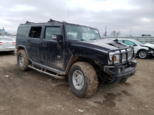 Фото 4 с аукциона – 2004 HUMMER H2 с VIN 5GRGN23U74H121575
